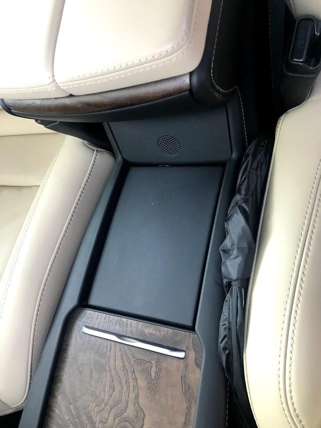 OC Sun Shade stored between seats in Tesla Model S